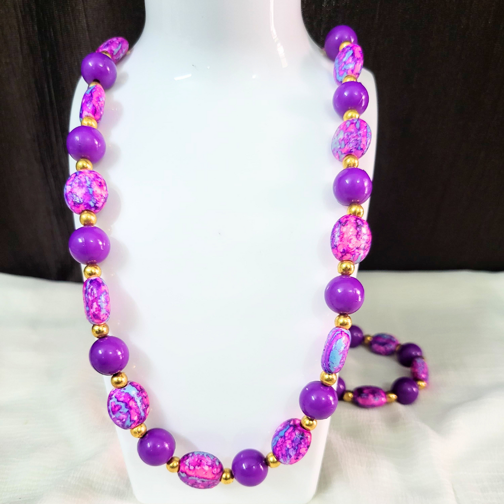 purple round & flat beaded necklace