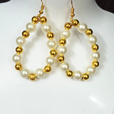 Golden white earrings