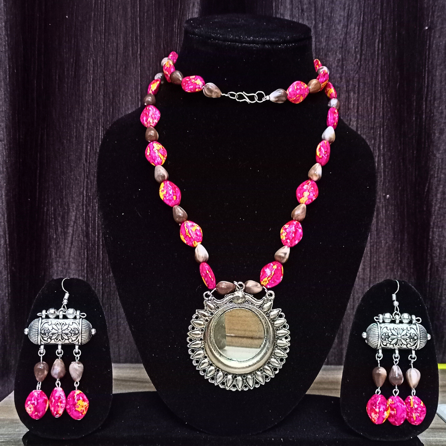 Brown pink beaded neckpiece with mirror pendant