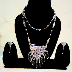 mor pendant with black flat beads