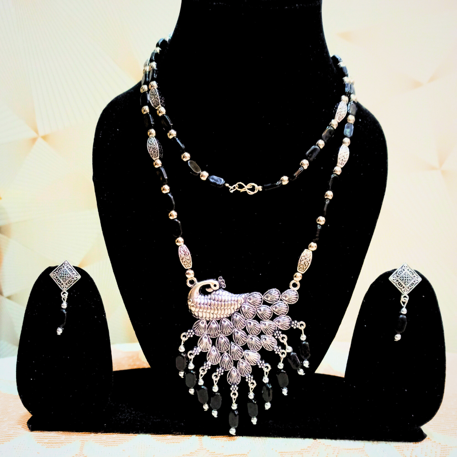 mor pendant with black flat beads