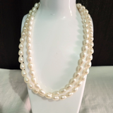 single layered  long white drop shaped neckpiece